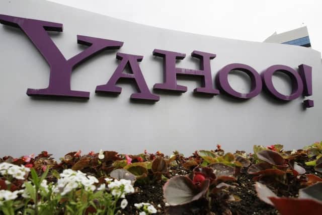 The Yahoo logo is displayed outside of the offices in Santa Clara, California. (AP Photo/Paul Sakuma, File)