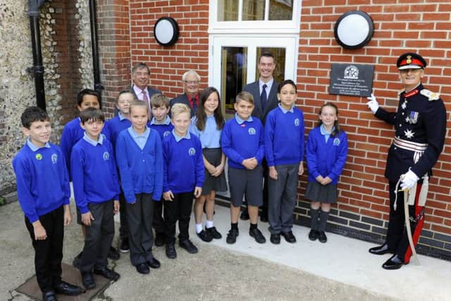 Children at Hambledon Primary School with, from left, governor Tony Higham, the county council's executive member for education Councillor Peter Edgar, headteacher Paul Davies and The Lord Lieutenant of Hampshire, Nigel Atkinson Picture: Malcolm Wells (160923-6930)