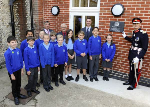 Children at Hambledon Primary School with, from left, governor Tony Higham, the county council's executive member for education Councillor Peter Edgar, headteacher Paul Davies and 

The Lord Lieutenant of Hampshire, Nigel Atkinson
 
Picture: Malcolm Wells (160923-6930)