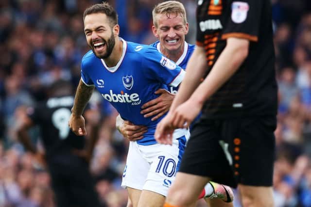 Milan Lalkovic celebrates his goal with Carl Baker Picture: Joe Pepler
