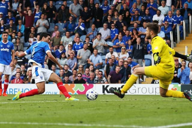 Danny Rose applies the finishing touch to Pompey's 5-1 win over Barnet today Picture: Joe Pepler