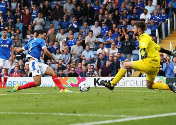 Danny Rose applies the finishing touch to Pompey's 5-1 win over Barnet today Picture: Joe Pepler