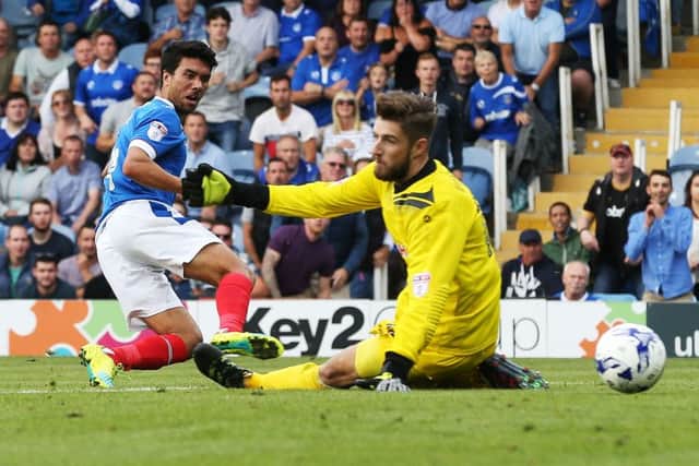 Danny Rose scores Pompey's fifth goal in their 5-1 victory over Barnet Picture: Joe Pepler