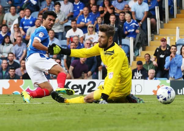 Danny Rose scores Pompey's fifth goal in their 5-1 victory over Barnet Picture: Joe Pepler