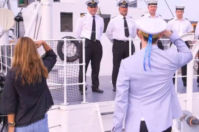 Louise Redknapp and her professional dance partner Kevin Clifton salute officers Picture: BBC