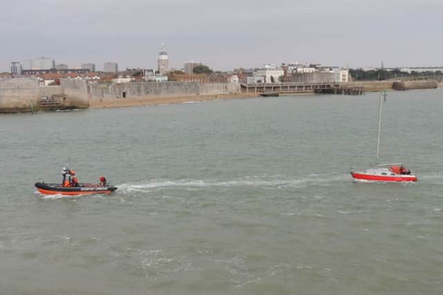 Gosport independent lifeboat (Gafirs) tow a 26ft yacht to safety in Portsmouth Harbour on Saturday Picture: Gosport NCI