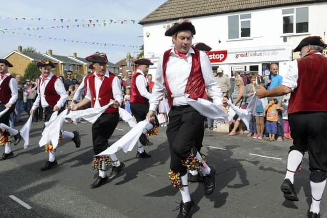 Morris dancers entertain the crowds Picture: Ian Hargreaves (161236-5)
