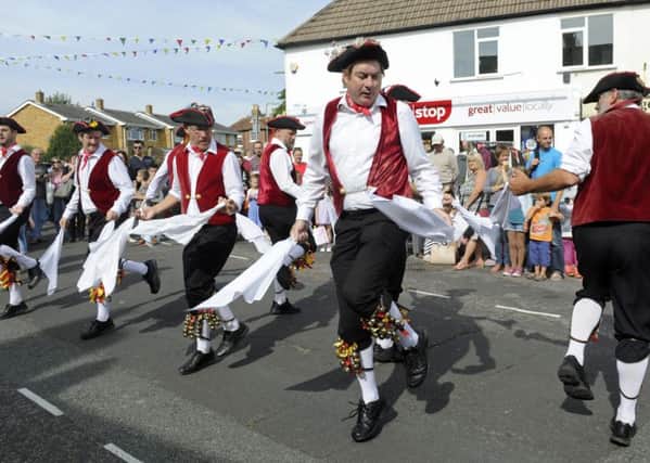 Morris dancers entertain the crowds  Picture: Ian Hargreaves (161236-5)