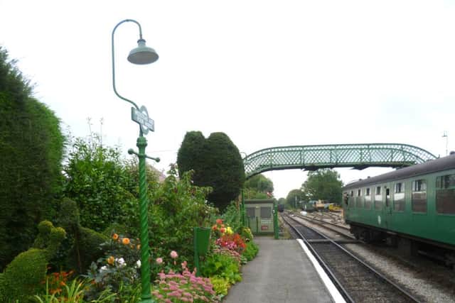 COUNTRY STATION The footbridge at Medstead and Four Marks on the Watercress Line     Picture: Marathon