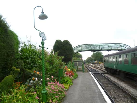 COUNTRY STATION The footbridge at Medstead and Four Marks on the Watercress Line     Picture: Marathon