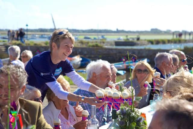 Northney ice cream is handed out at the community seafood lunch on Emsworth Quay Picture: John Tweddell