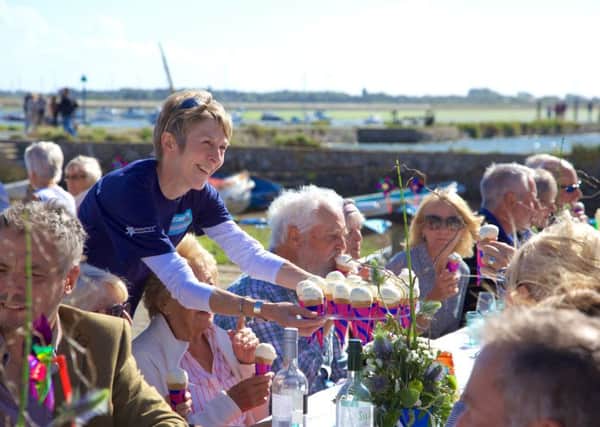 Northney ice cream is handed out at the community seafood lunch on Emsworth Quay Picture: John Tweddell