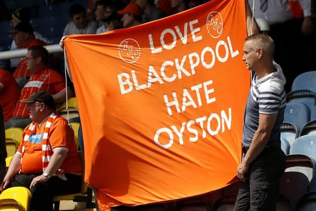 Blackpool fans protest against the running of the club by the Oyston family