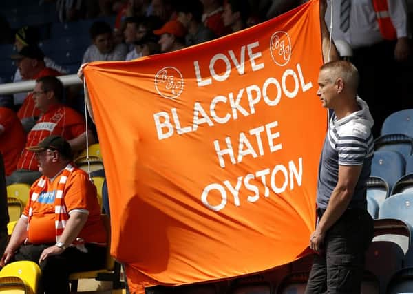 Blackpool fans protest against the running of the club by the Oyston family