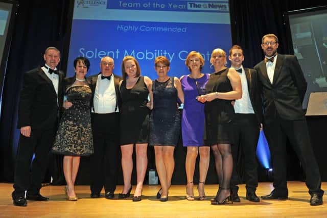 Solent Mobility Centre on stage after being highly commended in the Team of the Year category at The News Business Excellence Awards 2015