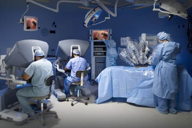 The Da Vinci robot in use Picture: Mark Clifford/Intuitive Surgical
