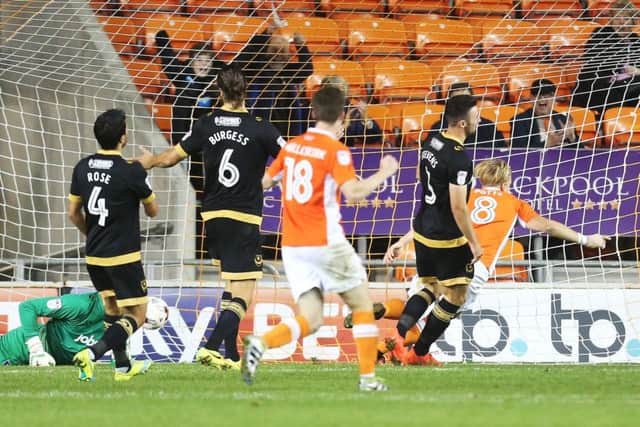 Brad Potts scores Blackpool's second goal Picture: Joe Pepler