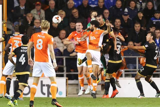 Kelvin Mellor gives Blackpool the lead against Pompey Picture: Joe Pepler