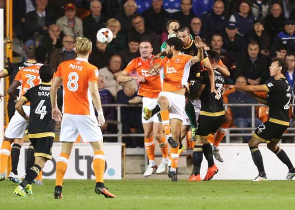 Kelvin Mellor gives Blackpool the lead against Pompey Picture: Joe Pepler