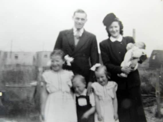 Ronald and Inge Philpot with Evelyn, Peter and Sylvia in front.
Two-week old Michael is in his mothers arms.