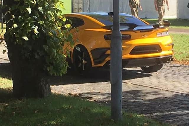 The yellow Chevrolet Camaro parked at Fort Blockhouse