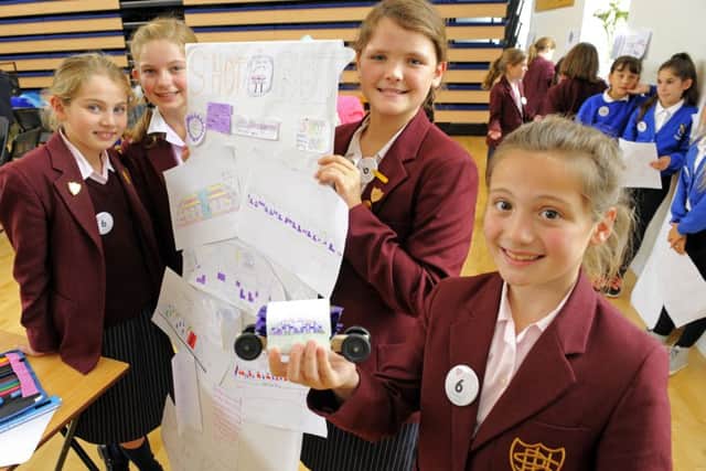 Youngsters from Portsmouth High School for Girls, from left, Hadiyh Roostaei, 10, Ella Paterson, nine, Olivia Davies, 10, and Gabby Luongo, nine Picture: Malcolm Wells (160927-8487)