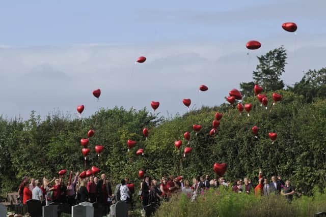 Balloons are released at the funeral of Lindsey Gates: Picture: Ian Hargreaves (161248-06)