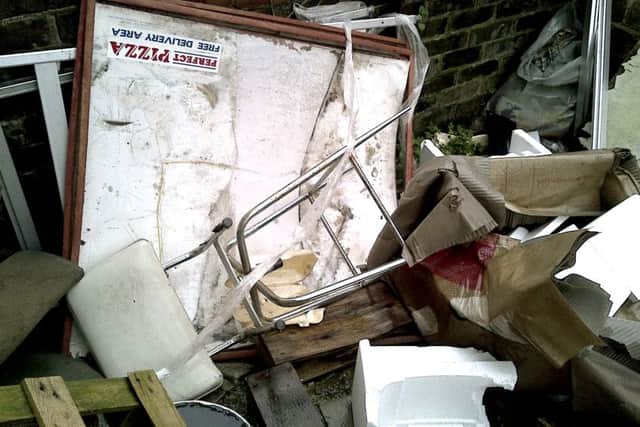 Rubbish in the back yard of Perfect Pizza in North End