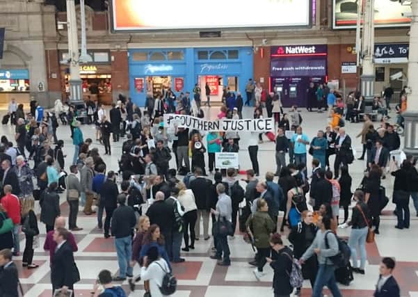 A protest by Southern Rail commuters at London Victoria station.