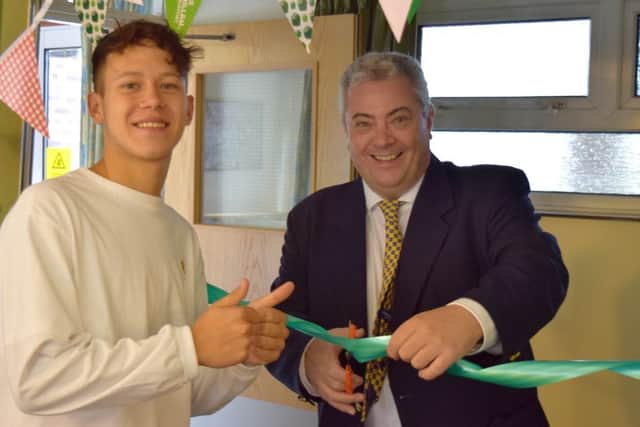 Britain's Got Talent star Isaac Waddington and Fareham borough councillor Geoff Fazackarley cut the ribbon on the Macmillan Coffee Morning at Assheton Court, Portchester