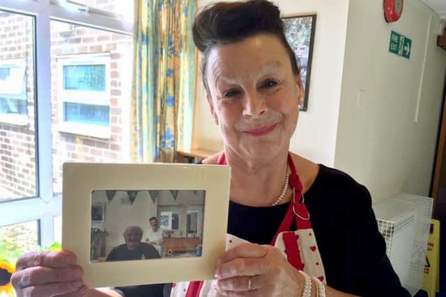 Sarah Storey with a picture of her and her partner John Manns, who died from prostate cancer earlier this year