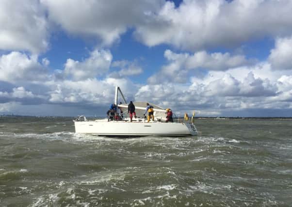 Gafirs rescuing a stranded 40-foot yacht in the Solent on October 1, 2016 PPP-160210-091309001