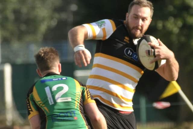 Portsmouth's Will Lockyer is tackled. Picture: Mick Young (161160-14)