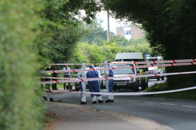 Police at the scene in Southleigh Road Picture: UKNIP