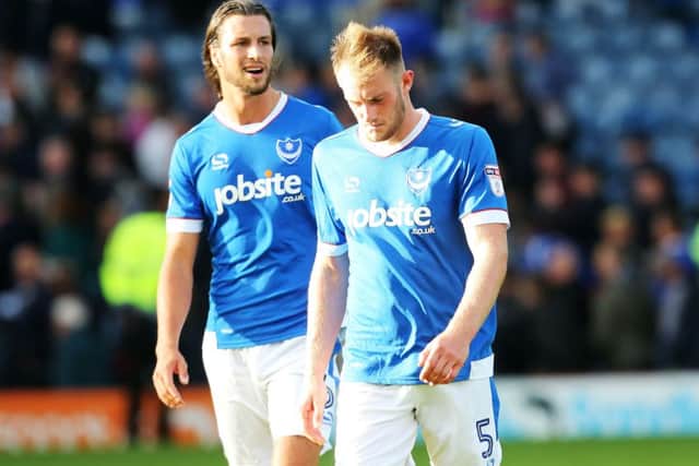 Pompey defenders Christian Burgess and Matt Clarke    Picture: Joe Pepler