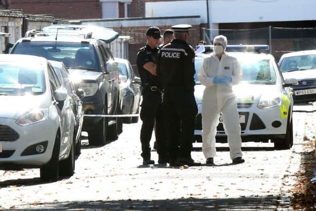 Police at the scene of the incident in in Lansdowne Street, Southsea