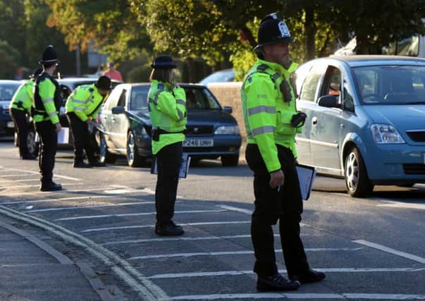 Police speak to drivers in Bury Road, Gosport Picture: UKNIP