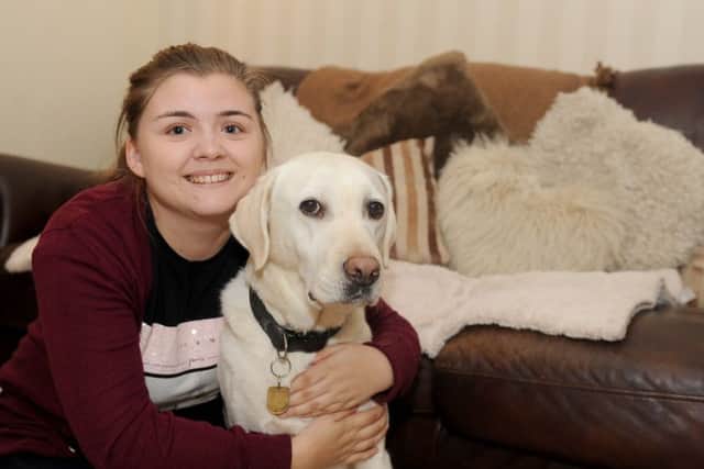Danielle Thomas with her guide dog Neisha