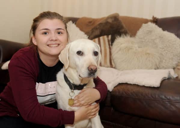 Danielle Thomas with her guide dog Neisha