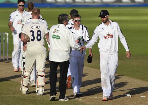 James Vince leads the handshakes at the end of Hanpshire's defeat to Durham on the final day of the season Picture: Neil Marshall