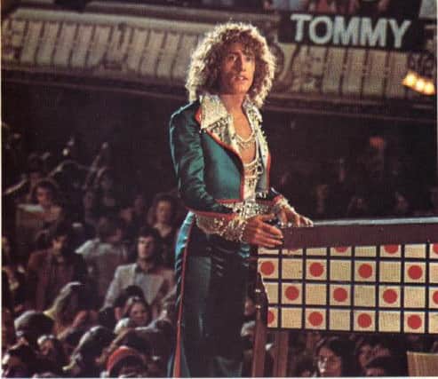 The Who's Roger Daltrey on stage at the Kings Theatre, Southsea, in 1974 during the filming of the band's rock opera Tommy