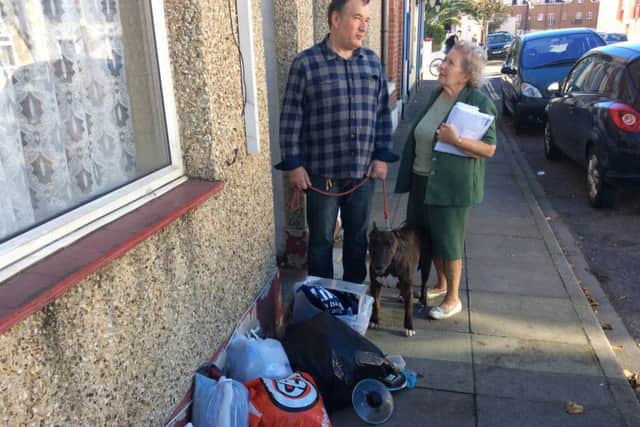 Portsmouth Lib Dem campaigners Margaret Adair and Richard Adair with rubbish dumped in Collingwood Road, SouthseaPicture: Lee Hunt