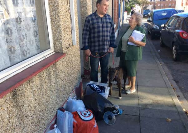 Portsmouth Lib Dem campaigners Margaret Adair and Richard Adair with rubbish dumped in Collingwood Road, Southsea

Picture: Lee Hunt