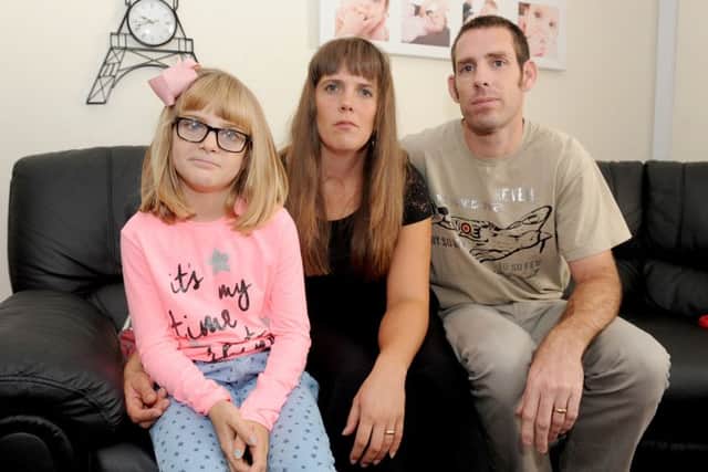 Parents Katrina and Daniel Handley with their daughter Jasmine  Picture: Sarah Standing (161377-3751)
