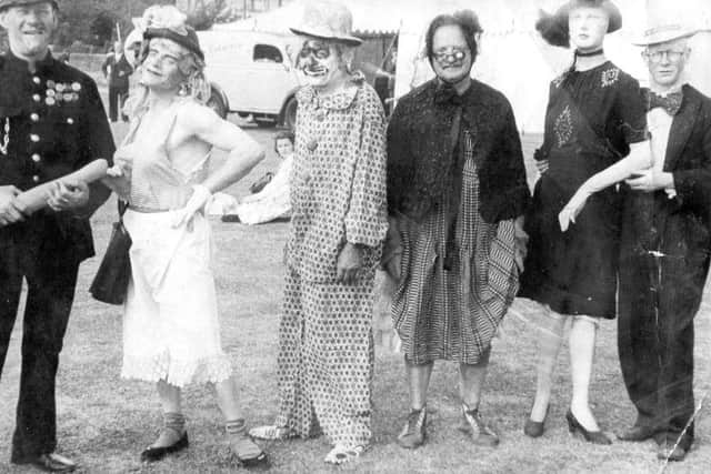 Drivers from United Breweries playing the fool at a family day. Bert Smiffy Smith is the clown.
