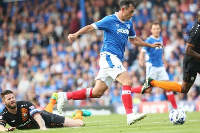 Gary Roberts beats his man before scoring against Barnet. Picture: Joe Pepler