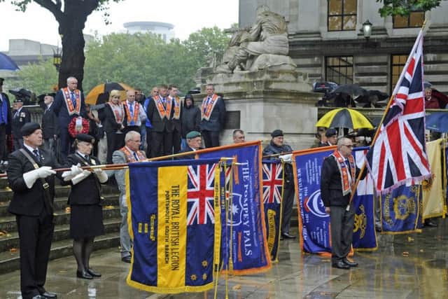 A ceremony held at the war memorial in Guildhall Square in memory of The Pompey Pals regiment