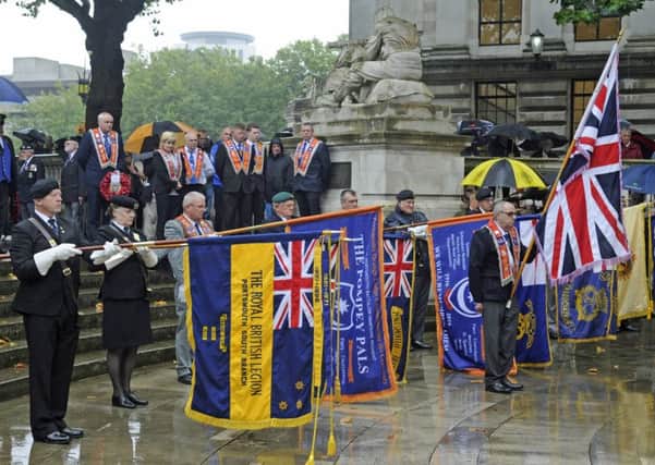 A ceremony held at the war memorial in Guildhall Square in memory of The Pompey Pals regiment
