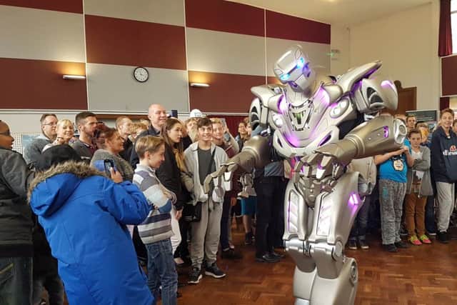 Titan the Robot wows the crowds at the new UTC school in Hilsea Picture: Kimberley Barber