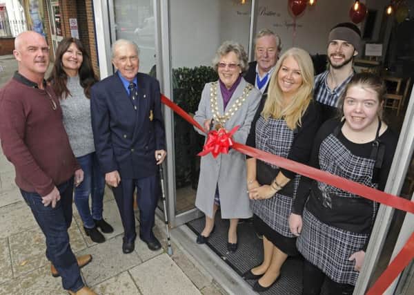 A new charity cafe with an aim to help people with learning disabilites find work, has opened in Fareham. (left to right), family members Grant Clegg and his girlfriend Susan Smith, David Clegg The Mayor of Fareham, Councillor Connie Hockley and Consort David Hockley, owner Amanda Barnes with son Kane Barnes and daughter Taylor Sanbrook.
Picture Ian Hargreaves (161257-1)